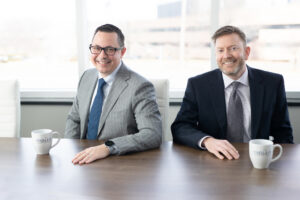 Hirzel Law attorneys consulting with community association board members